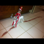 Elf on the Shelf rides reindeer