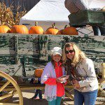 Rachel and her daughter posing at Schuett Farms in Muwonago, WI • The Lake Country Mom